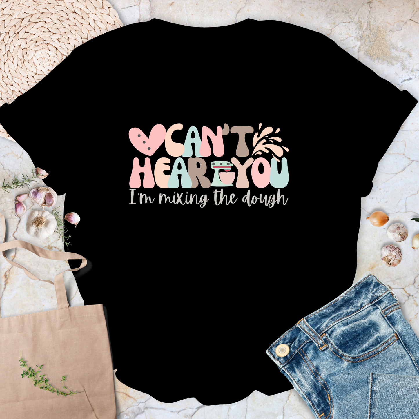 Can't hear you. I'm mixing the dough. T-Shirt