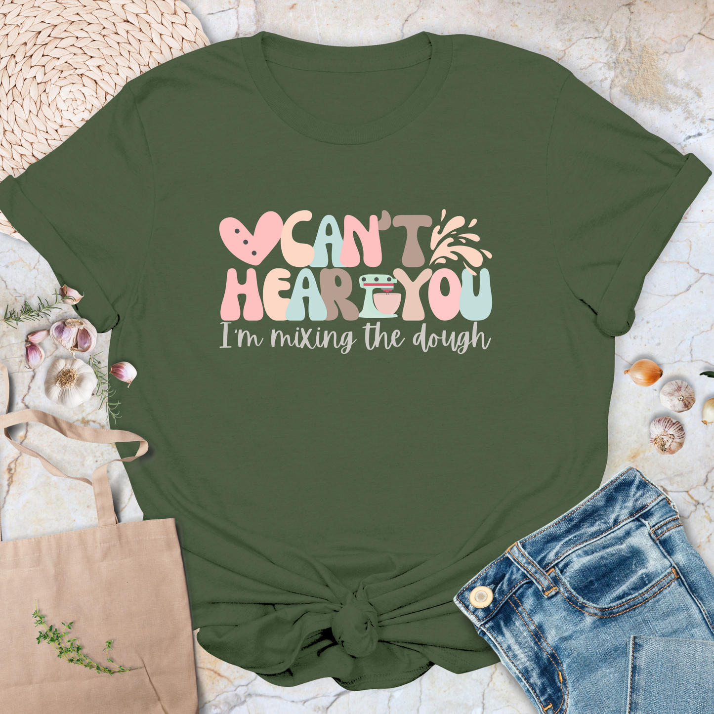 Can't hear you. I'm mixing the dough. T-Shirt