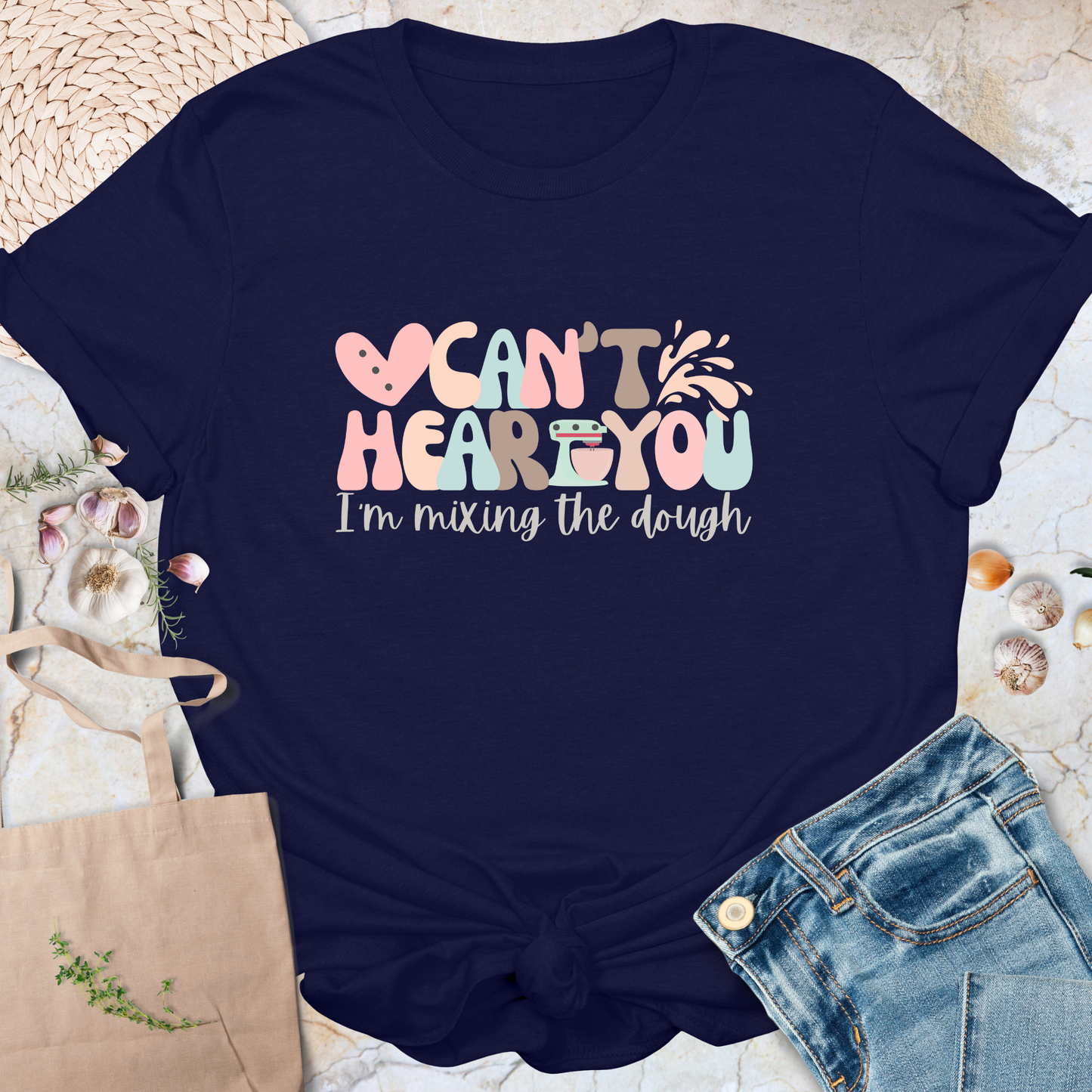 Can't hear you. I'm mixing the dough. T-Shirt