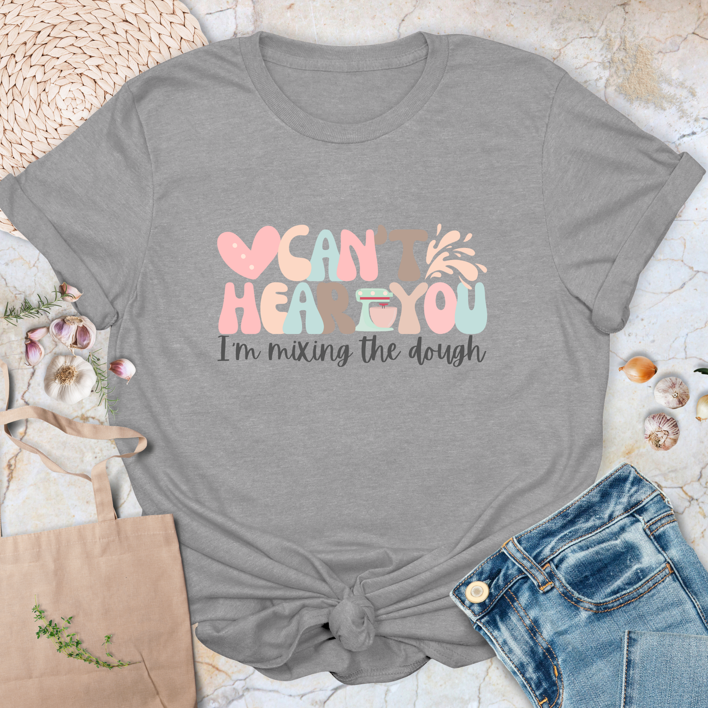 Can't hear you. I'm mixing the dough. T-Shirt